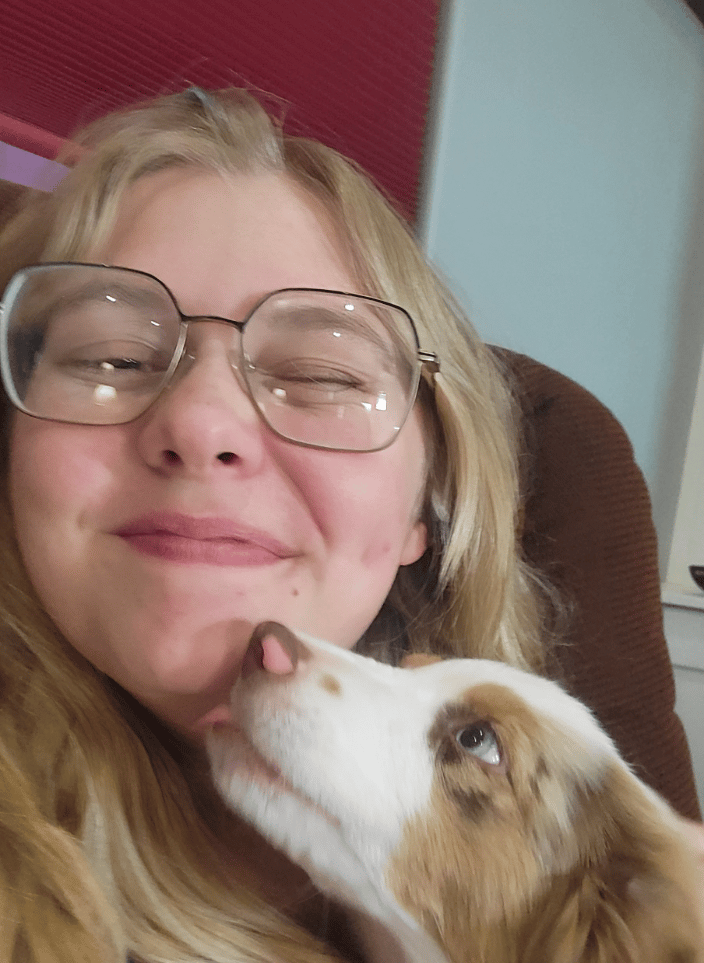 Receiving kisses from my dog, Bonnie